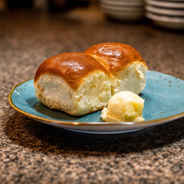 (2) Dinner Rolls with Honey Butter.